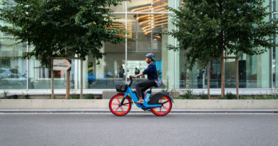DOTT e-bike being ridden in urban setting