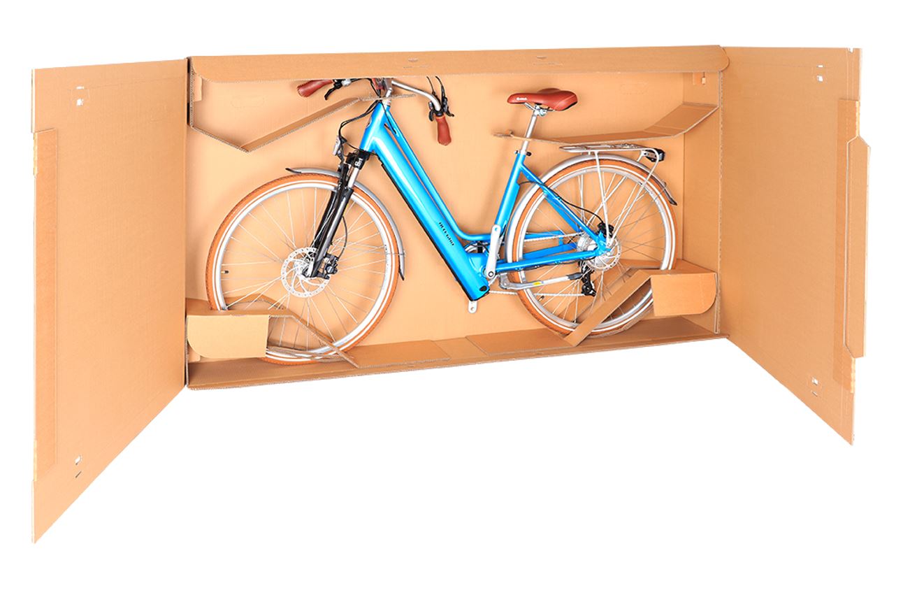 Как собрать велосипед из коробки. Упакованный велосипед. Упаковка велосипеда. Упакованный велосипед из коробки. Упаковка велосипеда для перевозки.