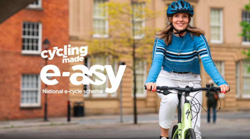 Cycling made e-asy graphic on left of image with woman riding toward camera on the right of image