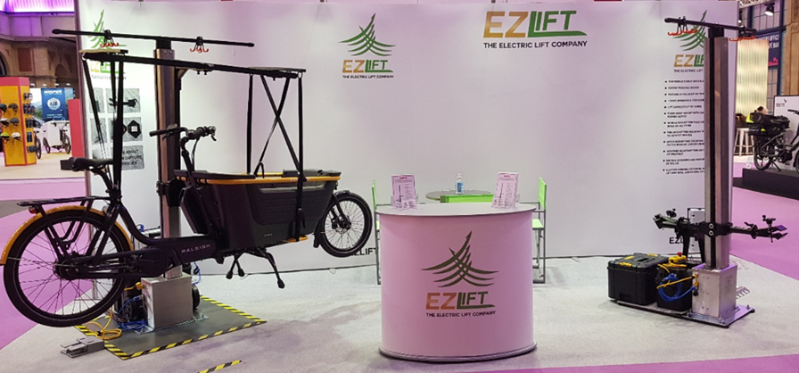 EZLift on the left with Cargo Carriage fitted and cargo bike lifted, on the right with claw fitted on both sides