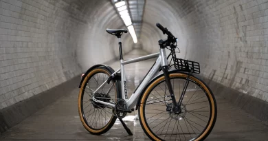 Volt London bike in an underground tunnel with roof mounted strip lighting