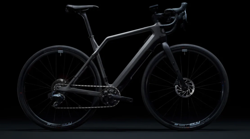 Studio picture of bike, drive side on, with black background and low light levels