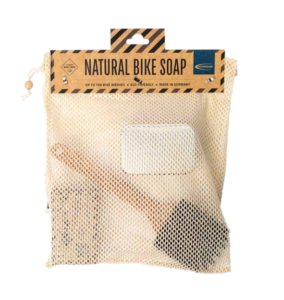 Schwalbe natural bike soap in packaging which includes horsehair brush and aluminium tin