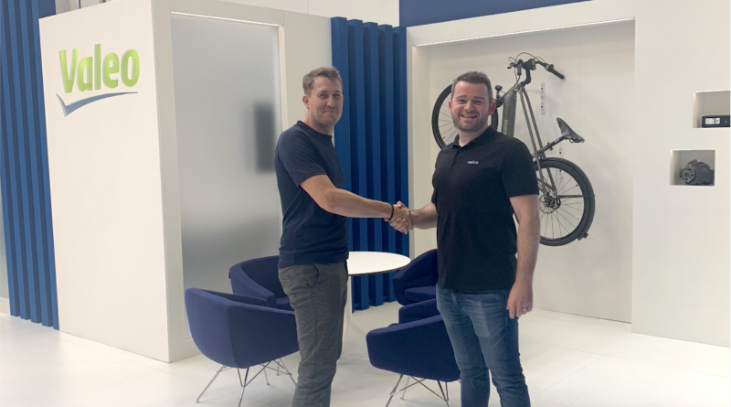 Valeo and Velco shake hands at Eurobike on exhibition stand