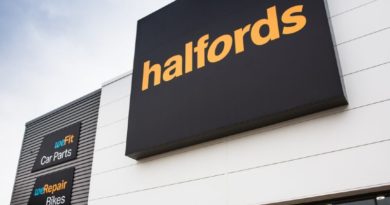 Halfords logo on side of store building