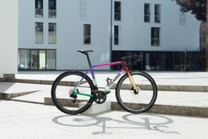 Colnago out in the sunshine on a white concrete flooring with white building backdrop 