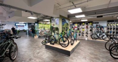 Cube concept store wide shot of floor layout with bikes on island in the middle