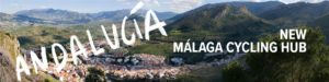 Banner with houses set in front of green mountains with Malaga cycle hub text overlay