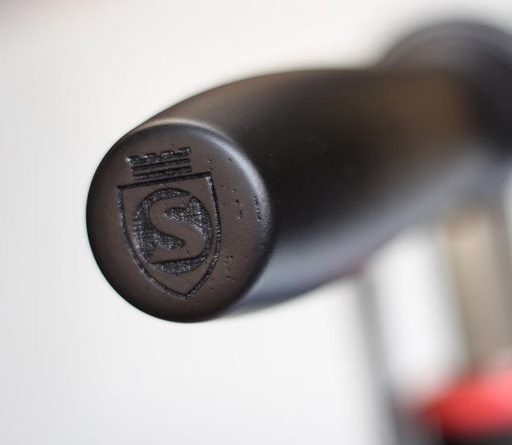 Close up of Silca logo machined into wooden pump handle end