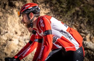Lotto Soudal riders close crop as they climb a mountain road