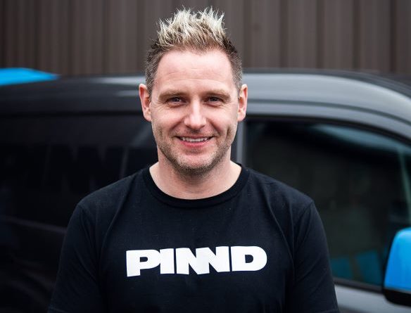 Jamie Duncan wearing PINND logo t-shirt