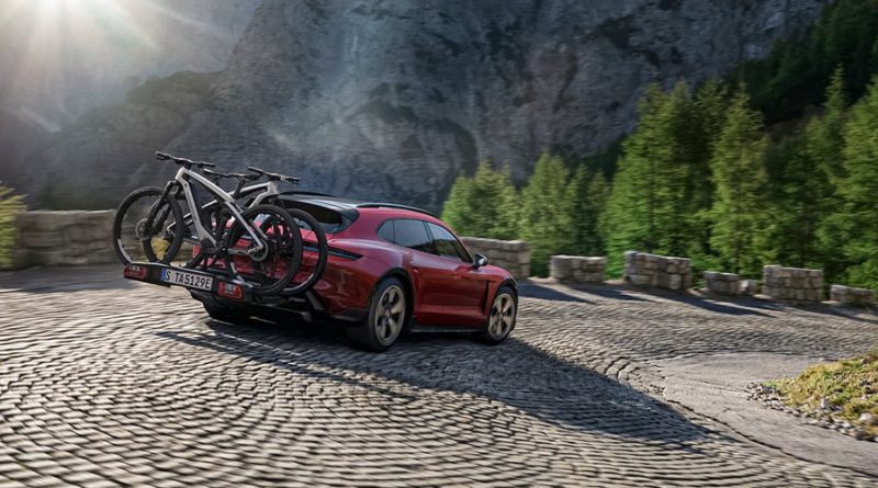 Porsche ev with bike rack fitted and eBikes on the back
