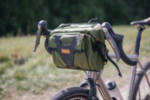 Olive colour Restrap Bar Pack fitted to gravel bike