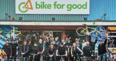 Volunteers gathered at the front of bike for good location