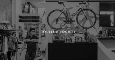 Customer in boutique bike retailer, with 'Rouleur Society' text overlay on image