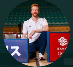 Ed Clancy in Team GB polo shirt and trousers