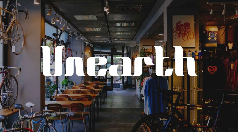 Picture of bikeshop with Unearth logo text overlay