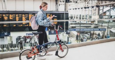 Woman with Brompton in train station