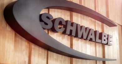 Schwalbe logo on wood wall