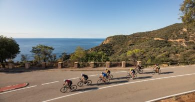 Sea Otter Europe explores the impact of Cycle Tourism. Picture shows road cyclists on a coastal road with blue skies and sea in shot