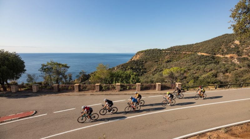 Sea Otter Europe explores the impact of Cycle Tourism. Picture shows road cyclists on a coastal road with blue skies and sea in shot