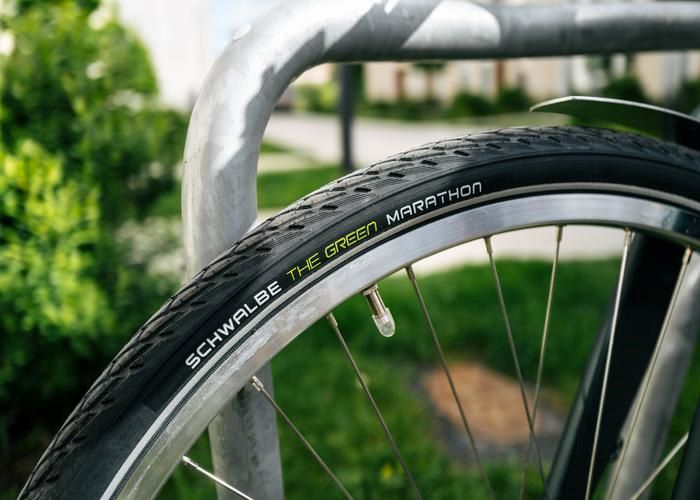 Schwalbe Green Marathon fitted to bike - close cross with logo in view