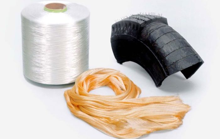 Seawastex recycled fishing net yarn on a real, with a tyre cut into a small stripped back, section