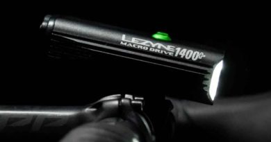 Side on shot of Lezyne light mounted to top side of road bike handle bar. Close crop shot