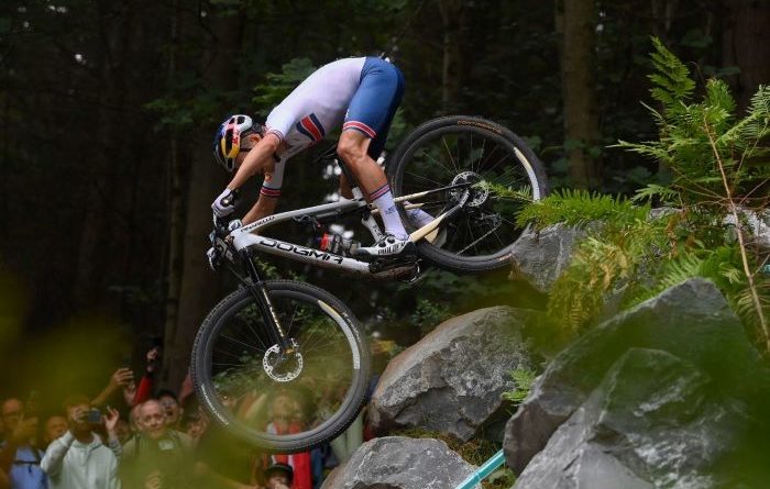 Tom Pidcock riding the rock drop at the Glentress UCI Worlds XC course