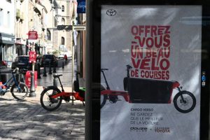 Billboard showing Toyota x Douze eCargo bike