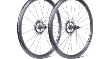 Ere Research GCR40 wheelset with discs mounted but no tyres. Studio shot on white background with wheels placed side by side, at a 45 degree angle, one overlapping the other.