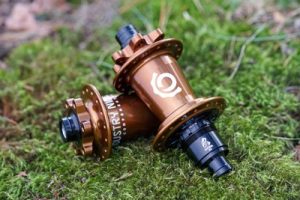 Industry Nine hubs in limited edition fall 2023 Bronze colour, lay on moss 