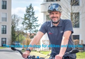 Stefan Dietrich on eBike. Text overlay reads, 'The mobile workshop for eBikes and bicycles'.