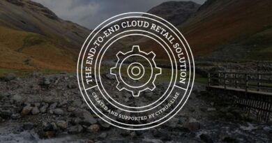 Graphic with, "The end to end cloud retail solution' over image of UK national park mountainous terrain